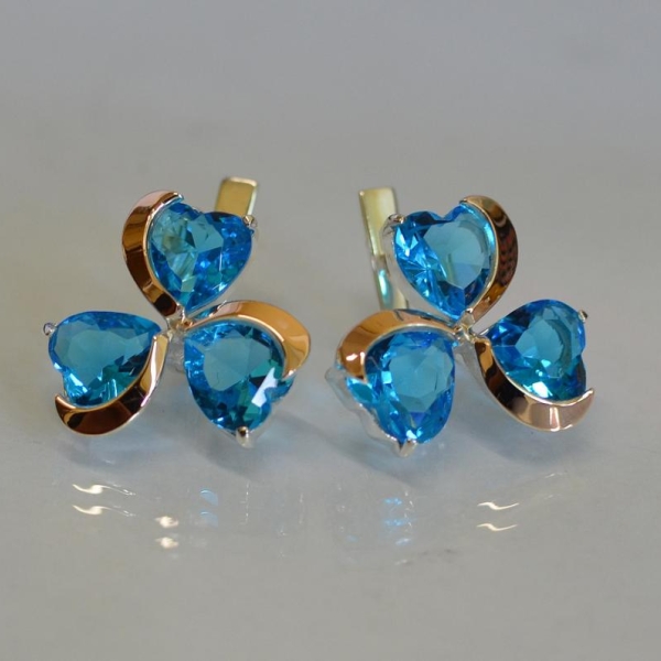 Срібні сережки з золотими напайками