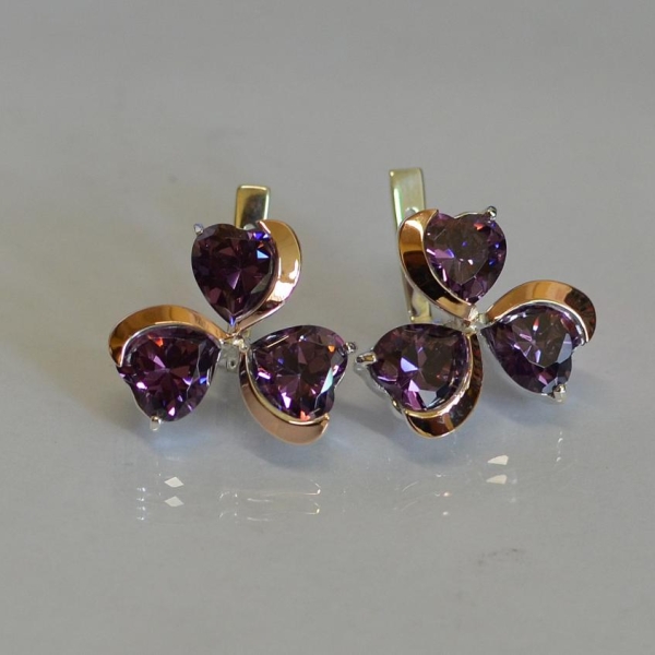 Срібні сережки з золотими напайками