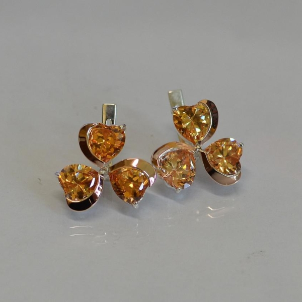 Срібні сережки з золотими напайками