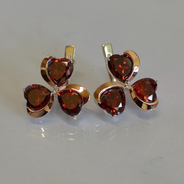 Срібні сережки з золотими напайками