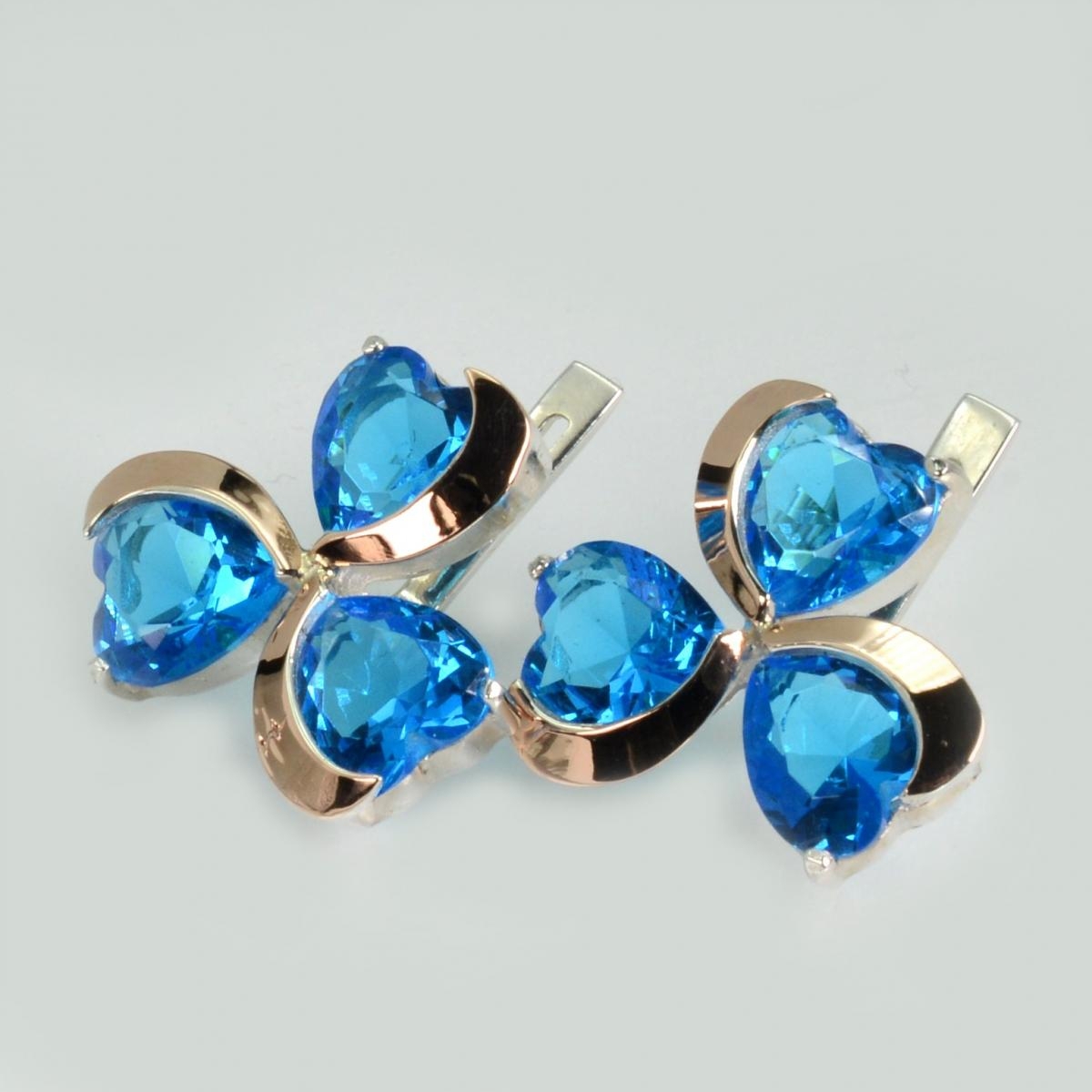 Срібні сережки з золотими напайками