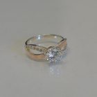 Срібна каблучка з золотими вставками