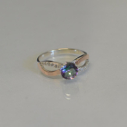 Срібна каблучка з золотими вставками