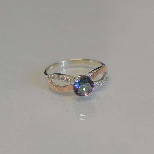 Срібна каблучка з золотими вставками