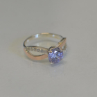 Срібна каблучка з золотими вставками