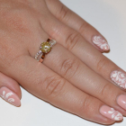 Срібна каблучка з золотими вставками