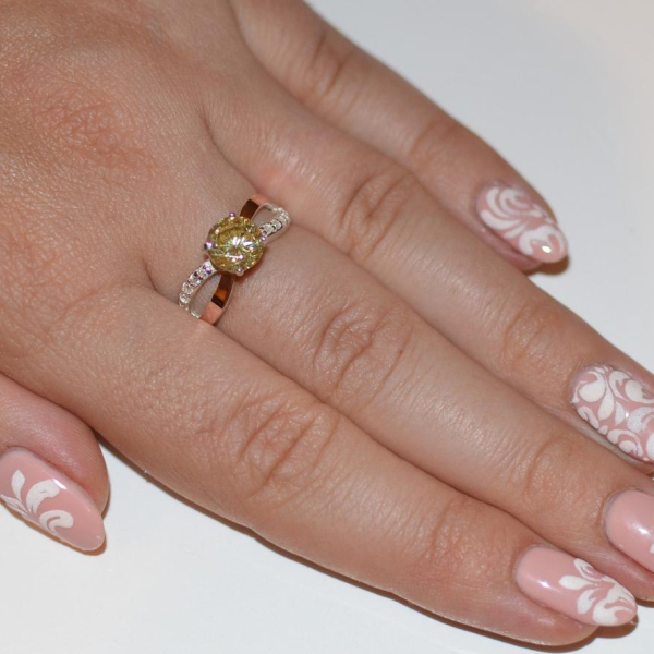 Срібна каблучка з золотими вставками