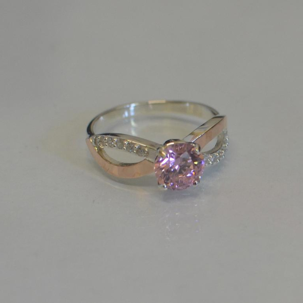 Срібна каблучка з золотими вставками