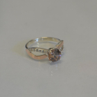 Срібна каблучка з золотими вставками