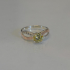 Срібна каблучка з золотими вставками