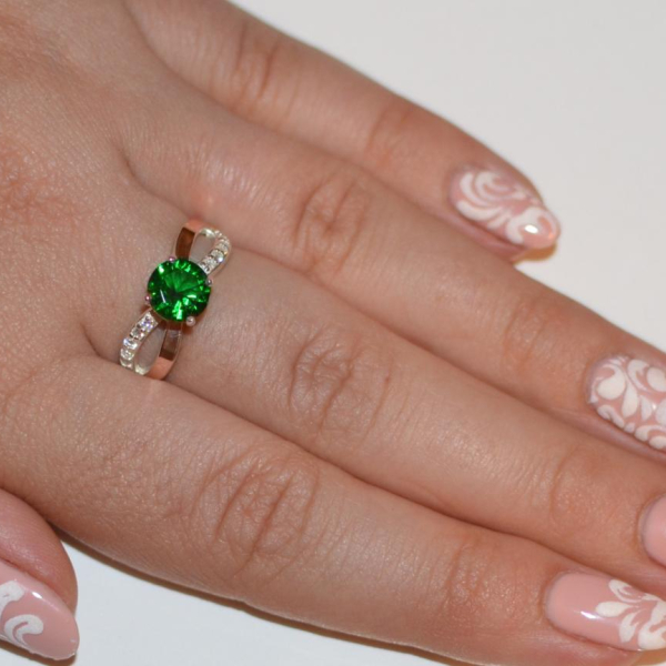 Срібна каблучка з золотими вставками