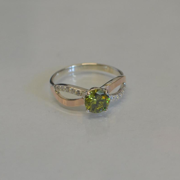 Срібна каблучка з золотими вставками