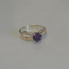 Срібна каблучка з золотими вставками