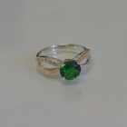 Срібна каблучка з золотими вставками