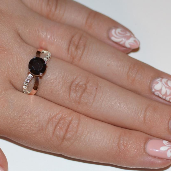 Срібна каблучка з золотими вставками