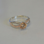 Срібна каблучка з золотими вставками