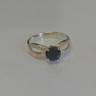 Срібна каблучка з золотими вставками