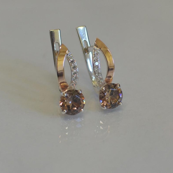 Срібні сережки з золотими накладками