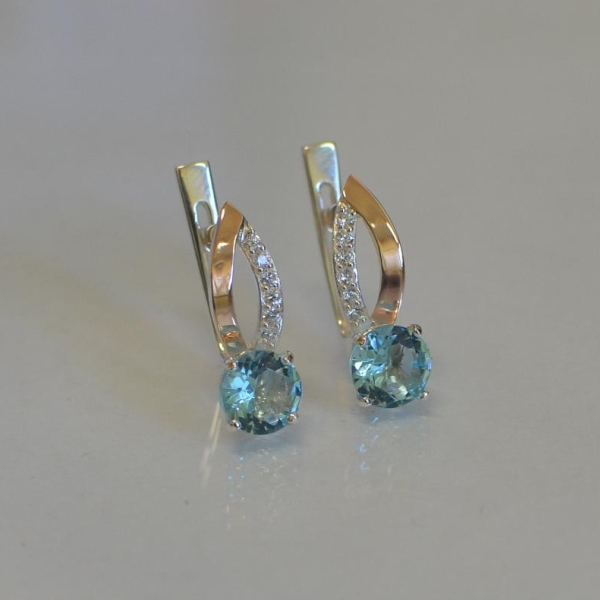 Срібні сережки з золотими накладками