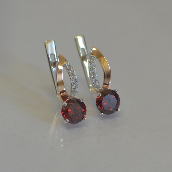 Срібні сережки з золотими накладками