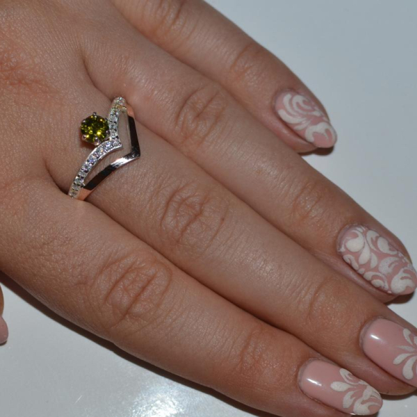 Срібна каблучка з золотими пластинами