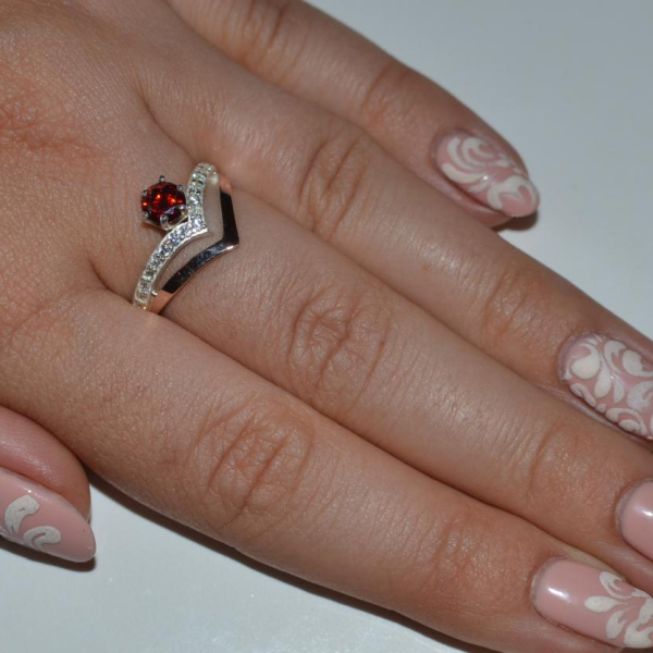 Срібна каблучка з золотими пластинами