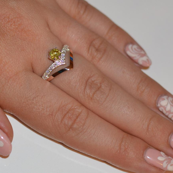 Срібна каблучка з золотими пластинами