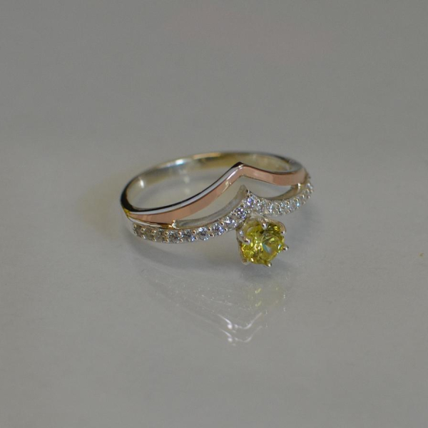 Срібна каблучка з золотими пластинами