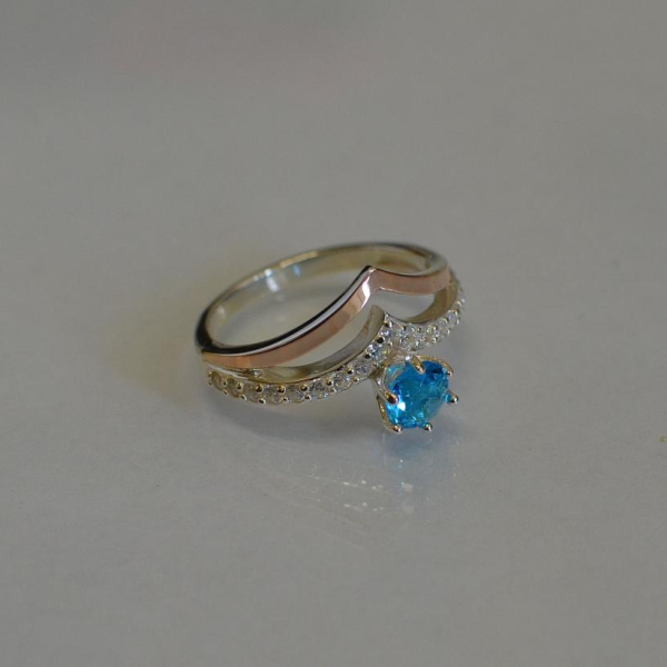 Срібна каблучка з золотими пластинами