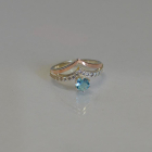 Срібна каблучка з золотими пластинами