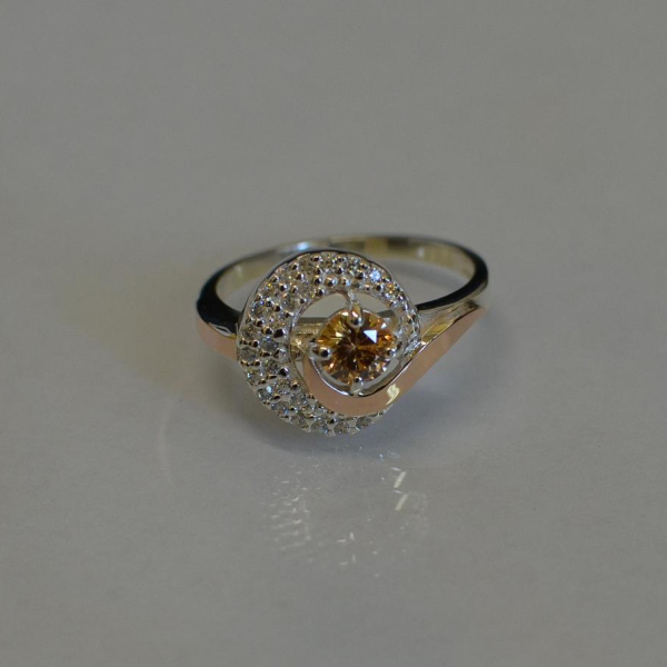 Срібна каблучка з золотими напайками