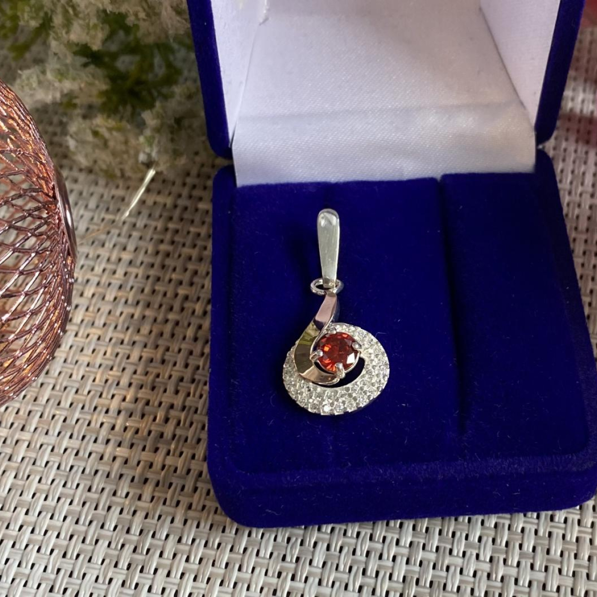 Срібна підвіска з пластинами золота