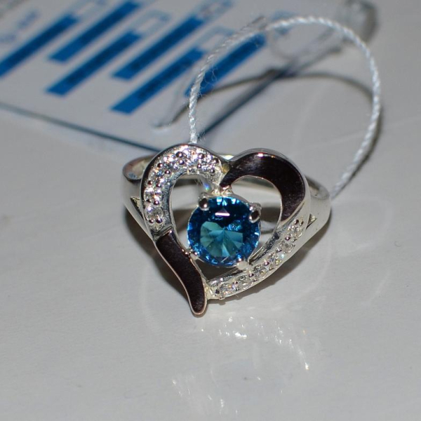 Срібна каблучка з золотими пластинами