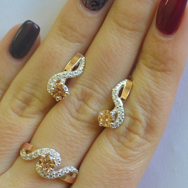 Срібний комплект з накладками з золота