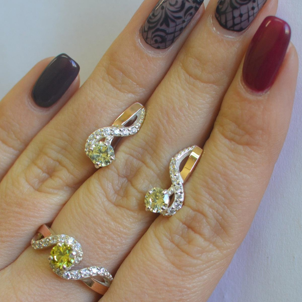 Срібний комплект з накладками з золота