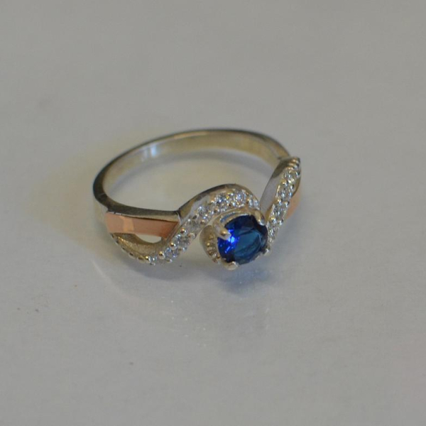 Срібна каблучка з золотими напайками