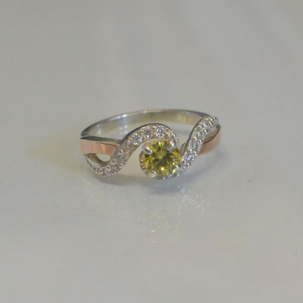 Срібна каблучка з золотими напайками