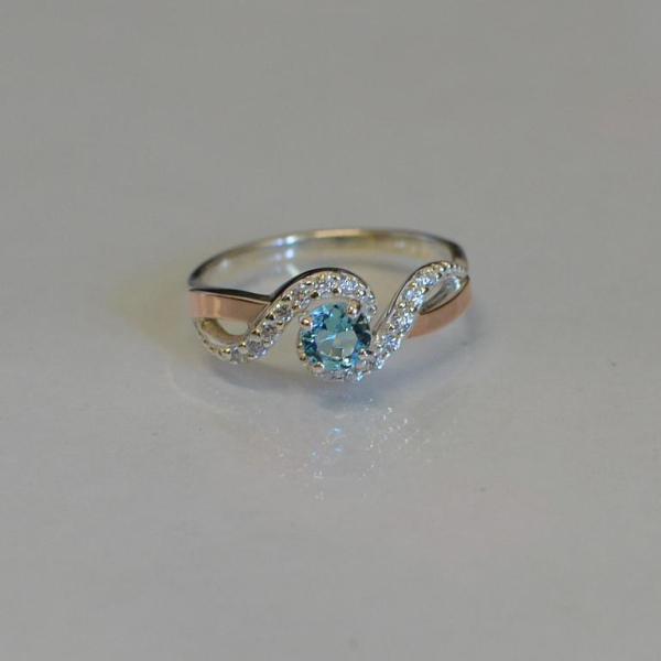 Срібна каблучка з золотими напайками