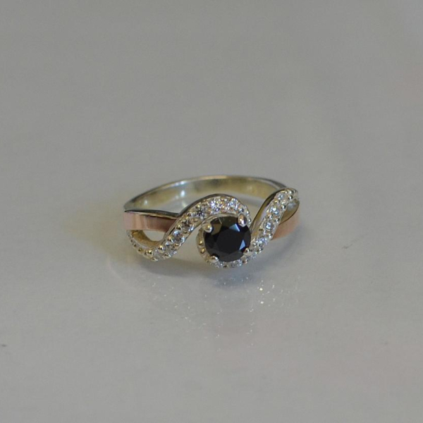 Срібна каблучка з золотими напайками