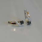 Срібні сережки з золотими напайками