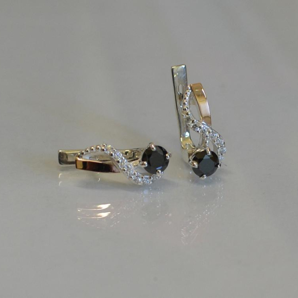 Срібні сережки з золотими напайками