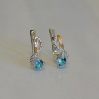 Срібні сережки з золотими напайками