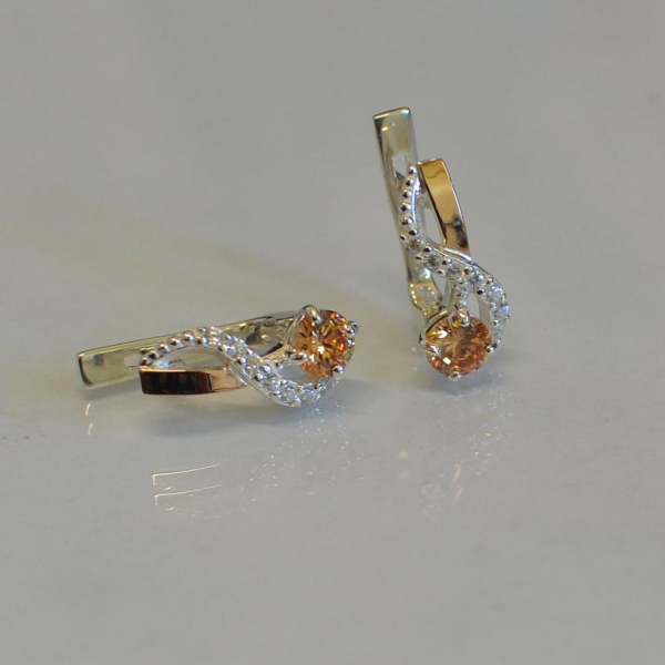 Срібні сережки з золотими напайками