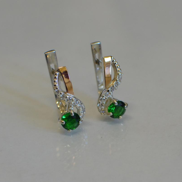 Срібні сережки з золотими напайками