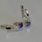 Срібні сережки з золотими напайками