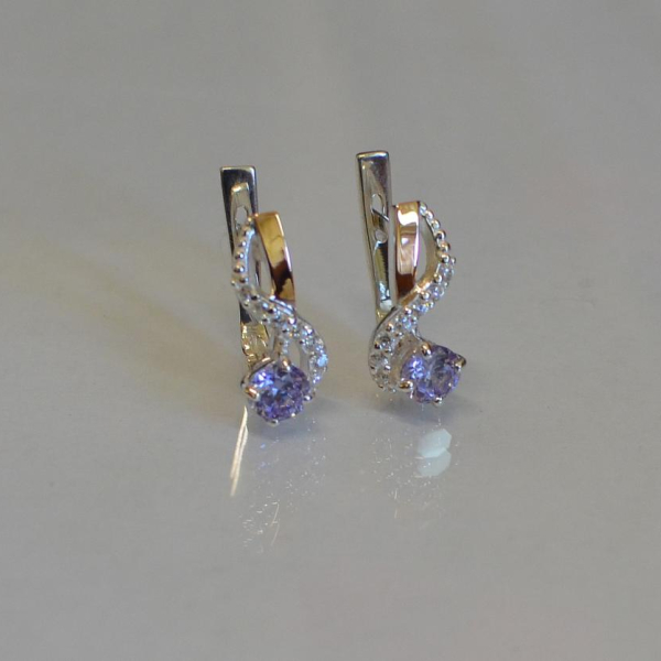 Срібні сережки з золотими напайками