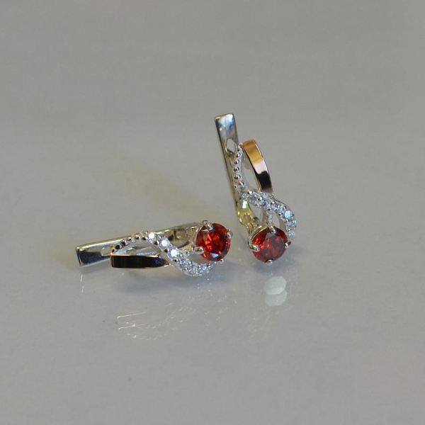 Срібні сережки з золотими напайками