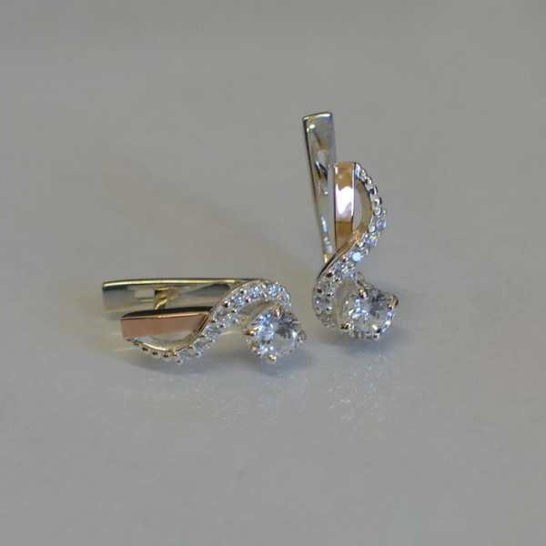 Срібні сережки з золотими напайками