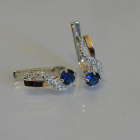 Срібні сережки з золотими напайками