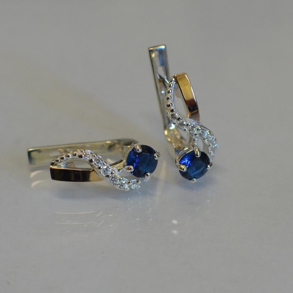 Срібні сережки з золотими напайками